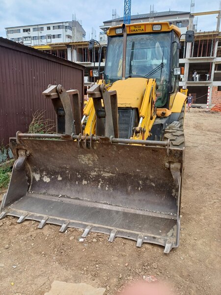 Buldoexcavator de vanzare zona Militari.